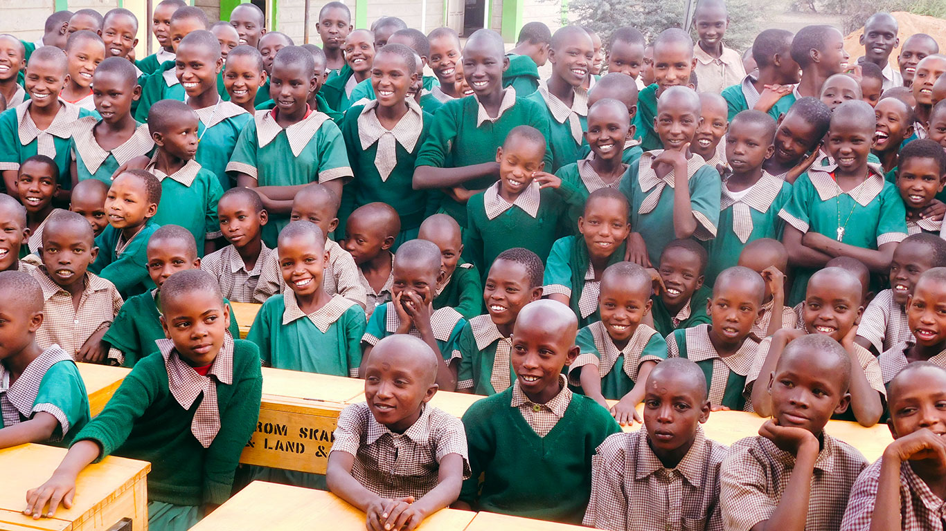 Children with desk donation