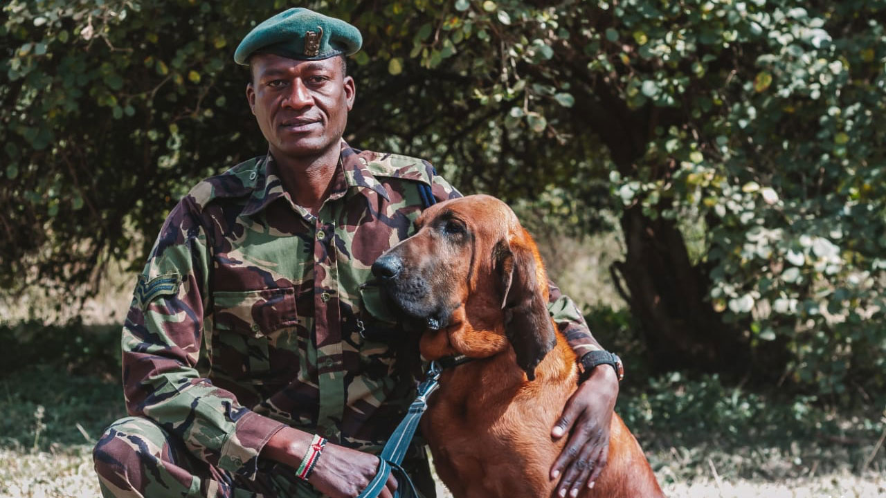 David Nkidedio with tracker dog Tipper