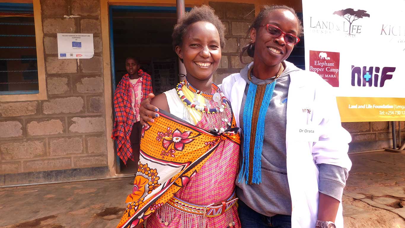 Happy doctor and patient after treatment